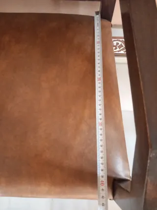 Poltrona vintage in pelle e legno