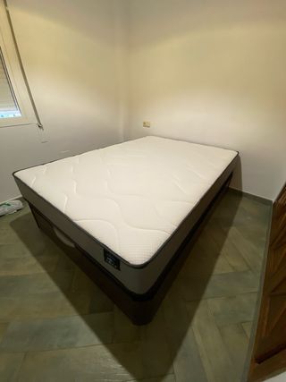 Canapé abatible de madera y tela