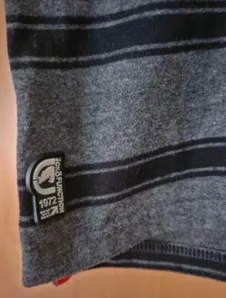 Polo rayas gris y negro niño 11-12 años