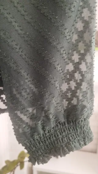 Blusón verde inglés con cuello alto