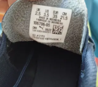 Zapatillas multitacos Puma amarillas y negras