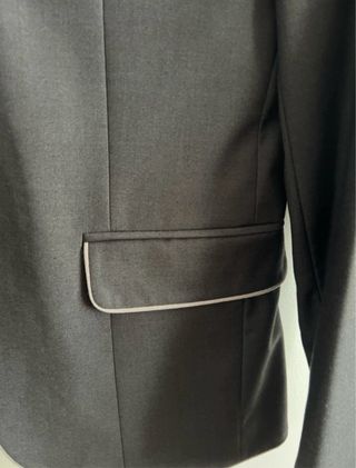 Americana H&M gris con ribete