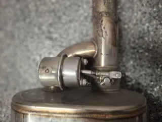 Tubo de escape con válvula