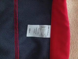 Chaqueta Quechua impermeable roja y gris