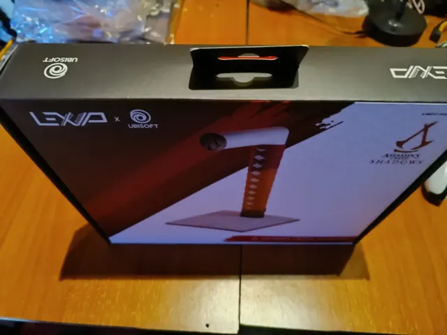 Soporte Auriculares Assassin's Creed Shadows