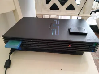 PlayStation 2 + Cámara + 2 Memory Cards + Juego
