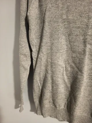 Jersey gris cuello alto lentejuelas