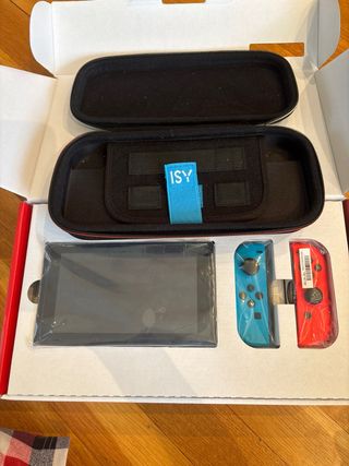 Nintendo Switch Azul y Rojo con videojuegos