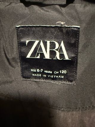 Plumas niño negro talla 6-7 120cm