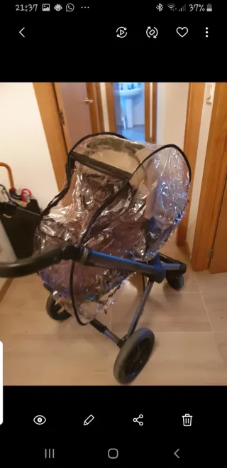 Carro de bebé marrón y beige