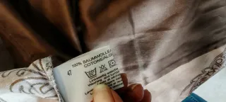 Copripiumino singolo con federa quadrata grande.