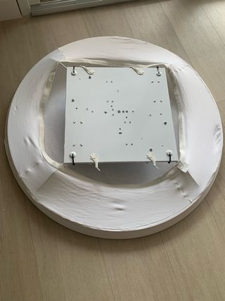 Lámpara fluorescente con aro metálico