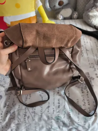 Mochila y monedero Parfois a juego