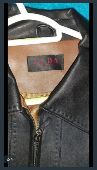 Chaqueta de piel negra y marrón