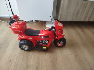Moto de juguete eléctrica para niños