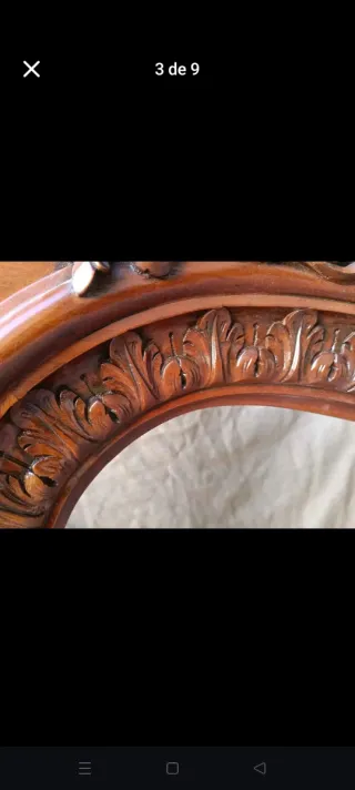 Chimenea de madera tallada con mármol