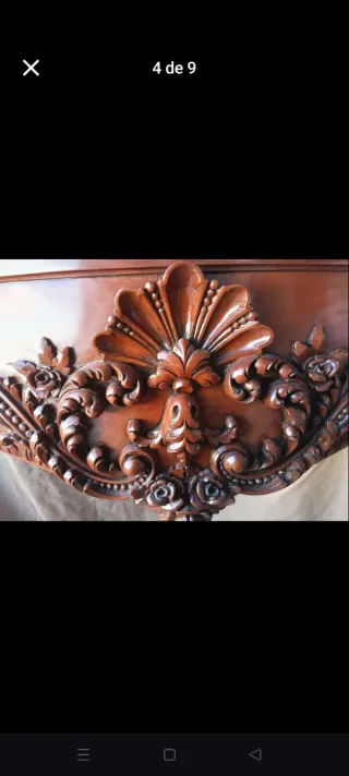 Chimenea de madera tallada con mármol