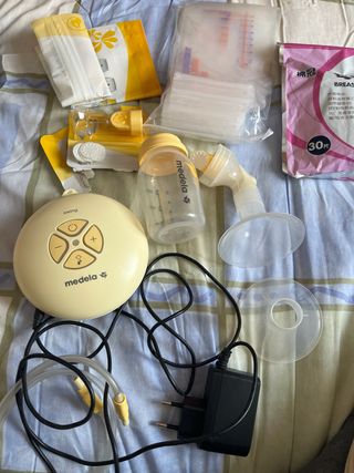 Sacaleches Medela Swing con 100bolsas guardaleche