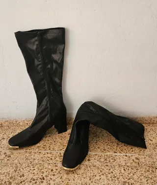 Botas altas negras con cremallera