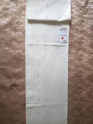 Juego de cama algodón bordado a mano.