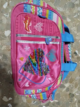 Bolso infantil rosa con lentejuelas