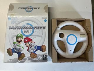Nintendo Wii Mini con accesorios y juegos