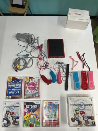 Nintendo Wii Mini con accesorios y juegos