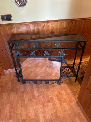 Mueble de forja con diseño de hojas y espejo