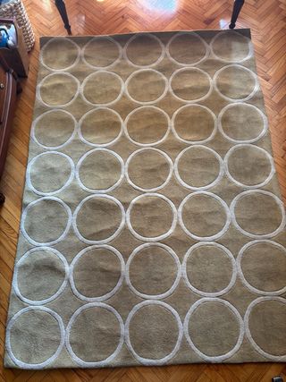 Tappeto di lana beige con cerchi
