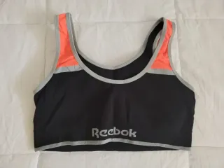 Sujetador deportivo Reebok negro y naranja