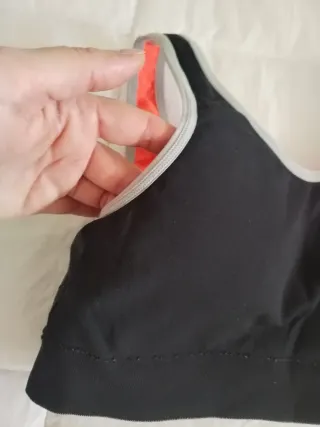 Sujetador deportivo Reebok negro y naranja