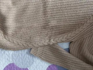 Maglioncino lavorato a trecce