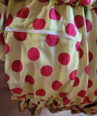 Traje de flamenca lunares verde y fucsia