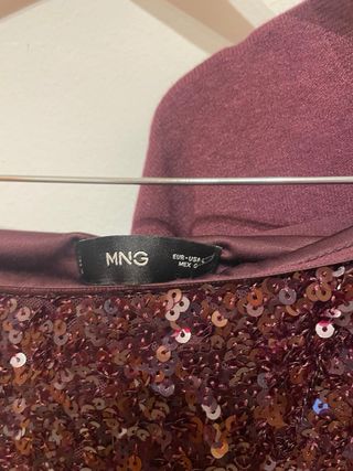 Falda lentejuelas y jersey flecos