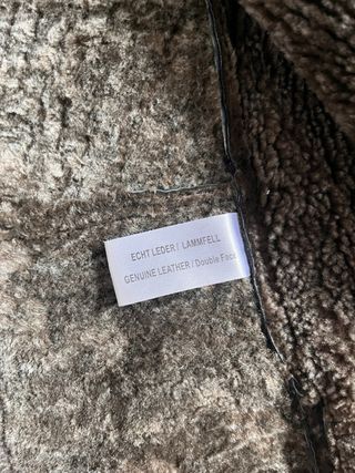 Abrigo piel negro con pelo