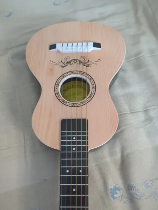 Mini guitarra H