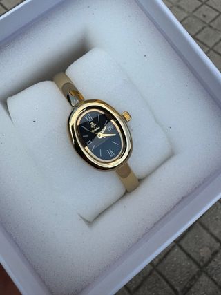 Orologio elegante nero e oro