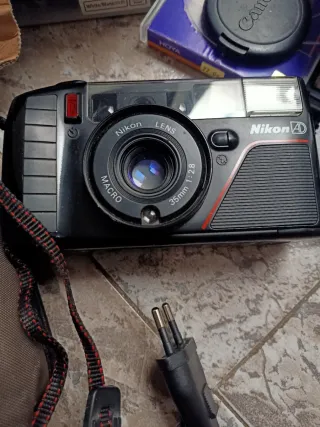 Consegna di fotocamere Canon, Nikon, Panasonic