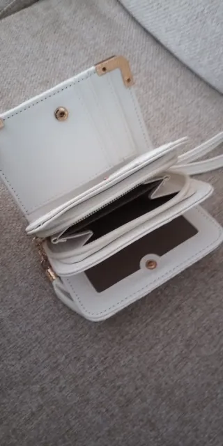 Bolso de mano Chanel blanco y dorado