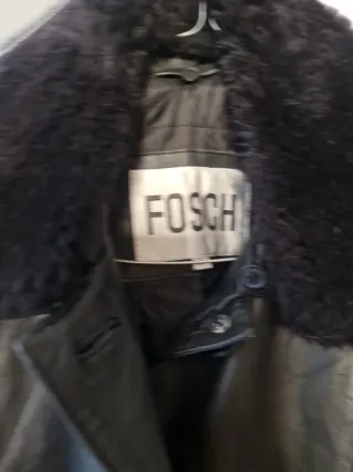 Chaqueta larga de piel negra