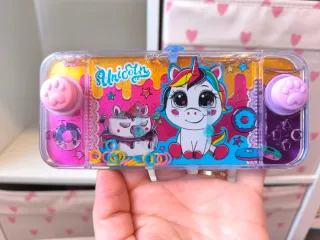 Juguete de agua unicornio con anillas