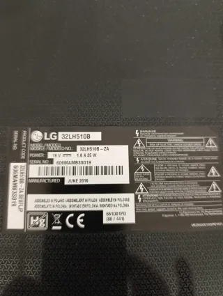 Televisor LG 32 Plata con soporte pared.