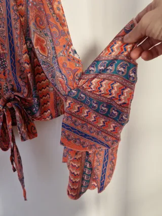 Blusa estampada manga larga