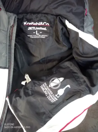 Plumífero Koröshi T L gris y blanco