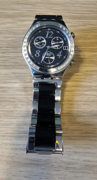 Reloj Swatch Irony Negro y Plateado. No usado.