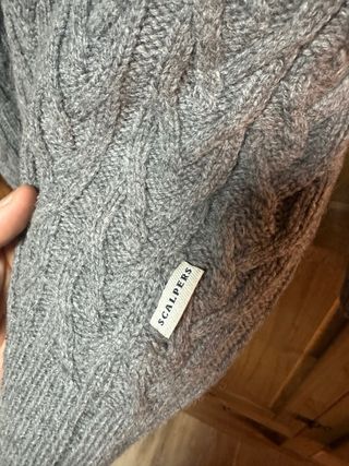 Jersey gris de punto trenzado