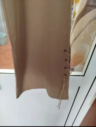 Pantalones campana beige con cordones