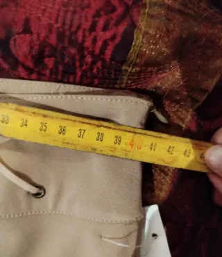 Pantalones campana beige con cordones