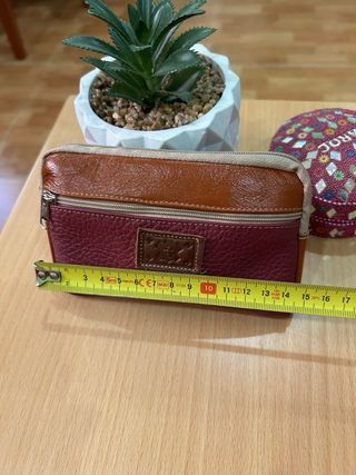 Dos monederos de piel sin estrenar