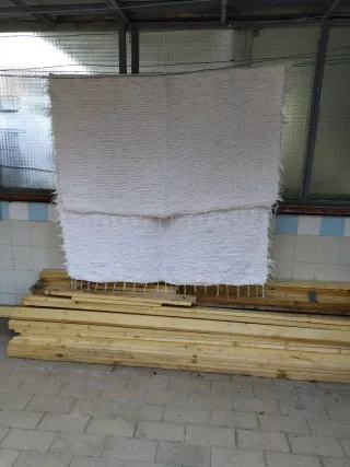 Alfombra de lana blanca. 1,35 x2,20 cm